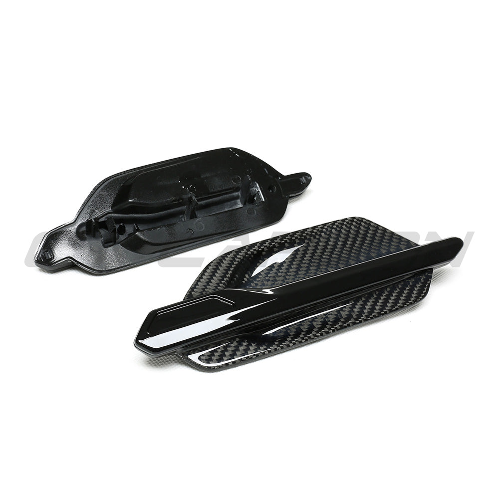 BMW M2 F87 carbon fibre side vents from CT Carbon, showcasing sleek, lightweight accessory with detailed carbon fiber weave.