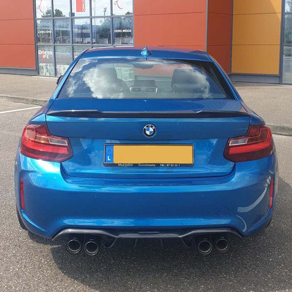 BMW M2 F87 carbon fibre diffuser by CT Carbon, showcasing sleek carbon fiber design and aerodynamic styling.
