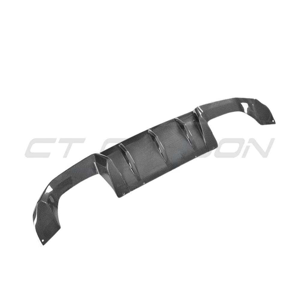 BMW M2 M2C F87 full carbon fiber kit by CT Carbon, showing the sleek carbon fiber components on the car's exterior.