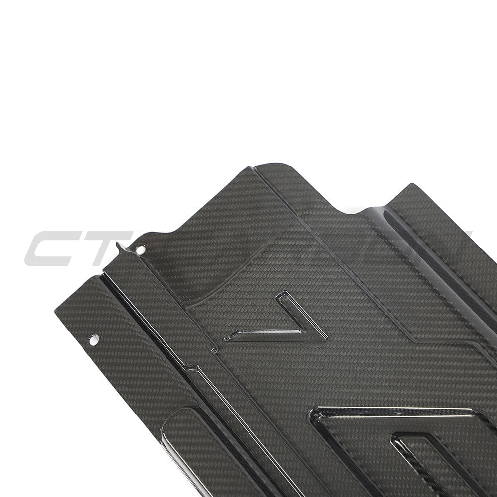 BMW M2, M3, M4 G87, G80, G81, G82, G83 carbon fiber engine dress-up kit by CT Carbon, showing sleek carbon fiber components.