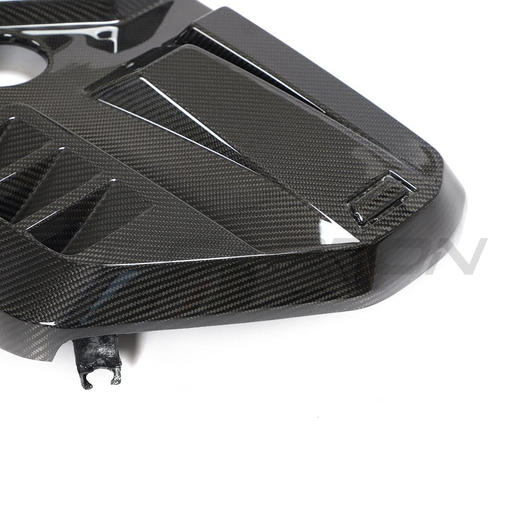 BMW M2, M3, M4 G87, G80, G81, G82, G83 carbon fiber engine dress-up kit by CT Carbon, showcasing sleek carbon fiber accessories.
