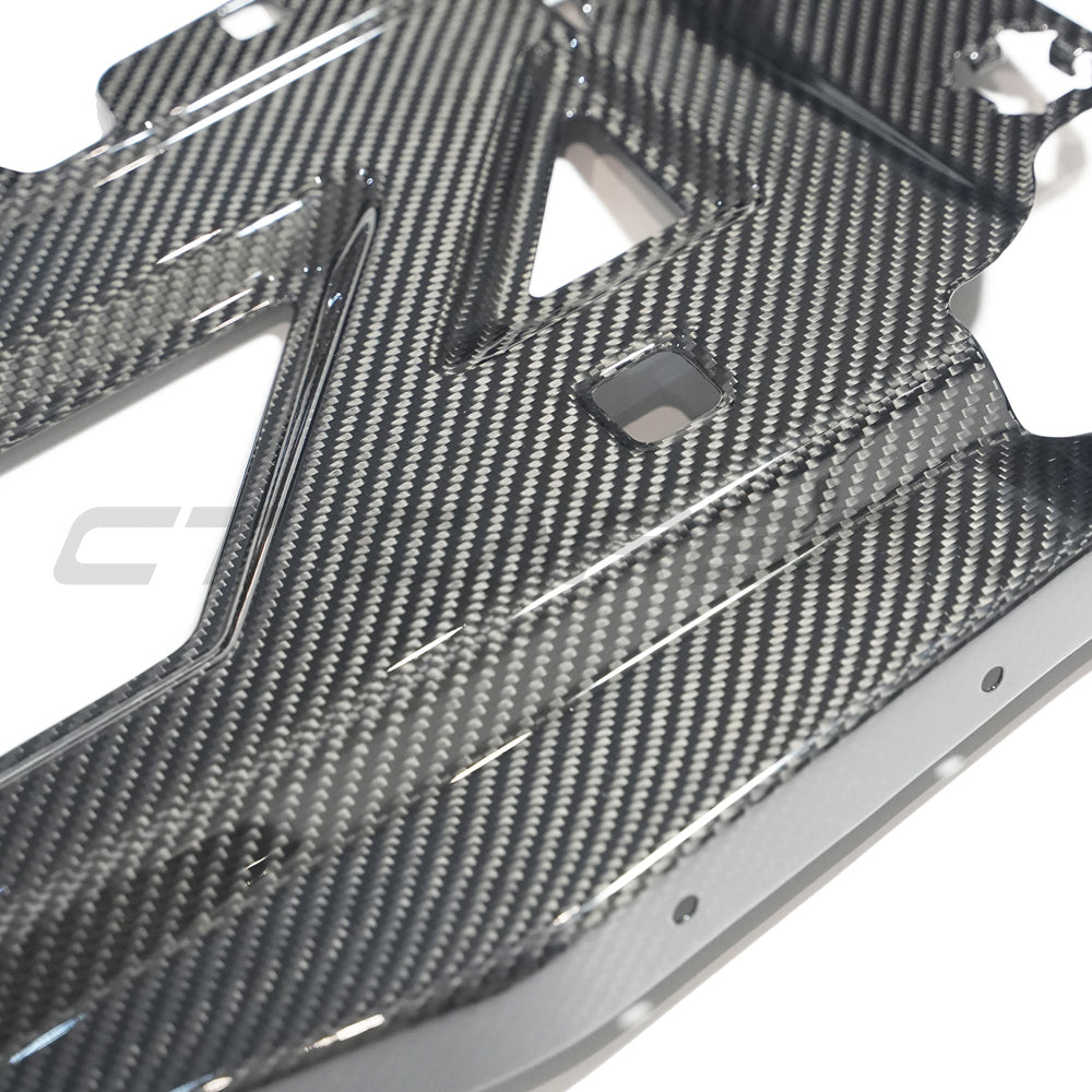 BMW M2, M3, M4 G87, G80, G81, G82, G83 Carbon Fibre Slam Panel Replacement accessory by CT Carbon showing close-up of panel.