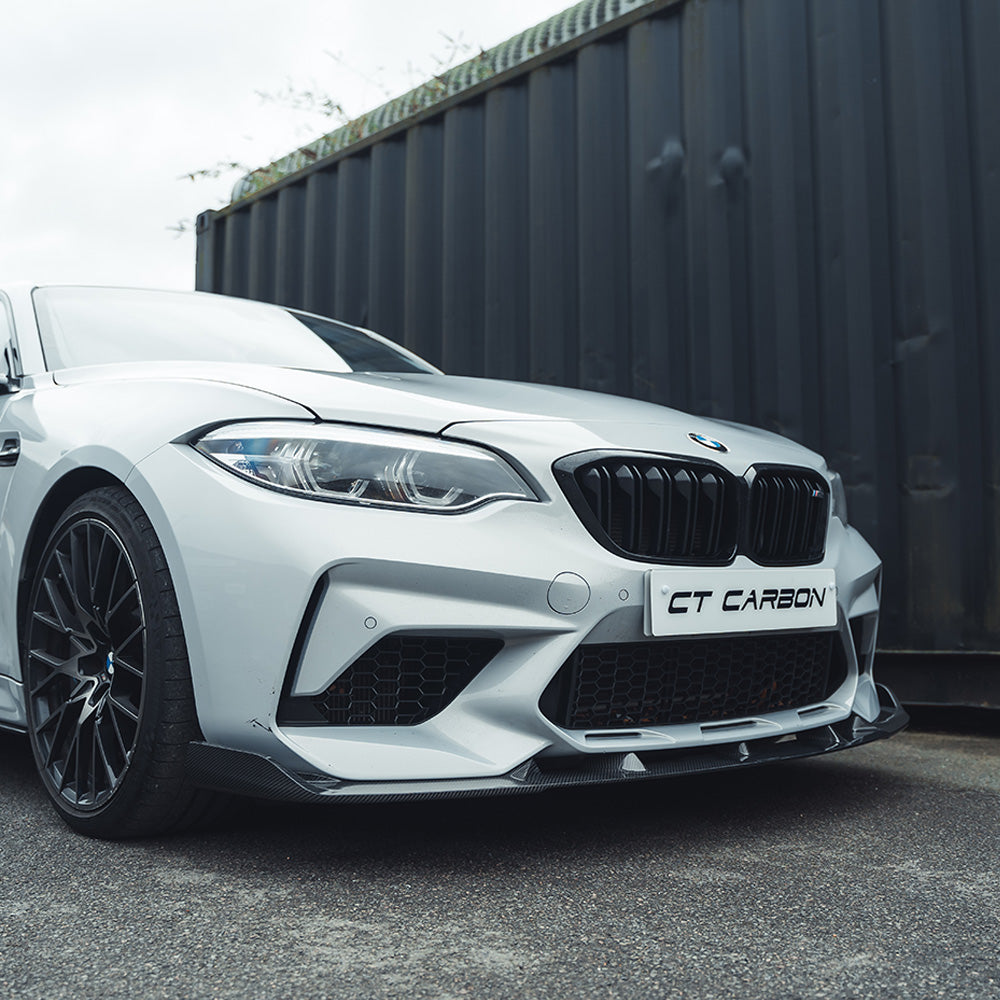 BMW M2C F87 2016-2021 CT Carbon carbon fiber splitter, V2 style, front aerodynamic accessory with a sleek 3D design.