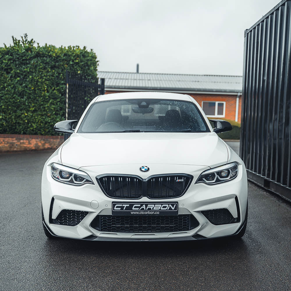 BMW M2C F87 carbon fibre splitter V3 by CT Carbon, showing the sleek, aerodynamic design of the high-performance car accessory.