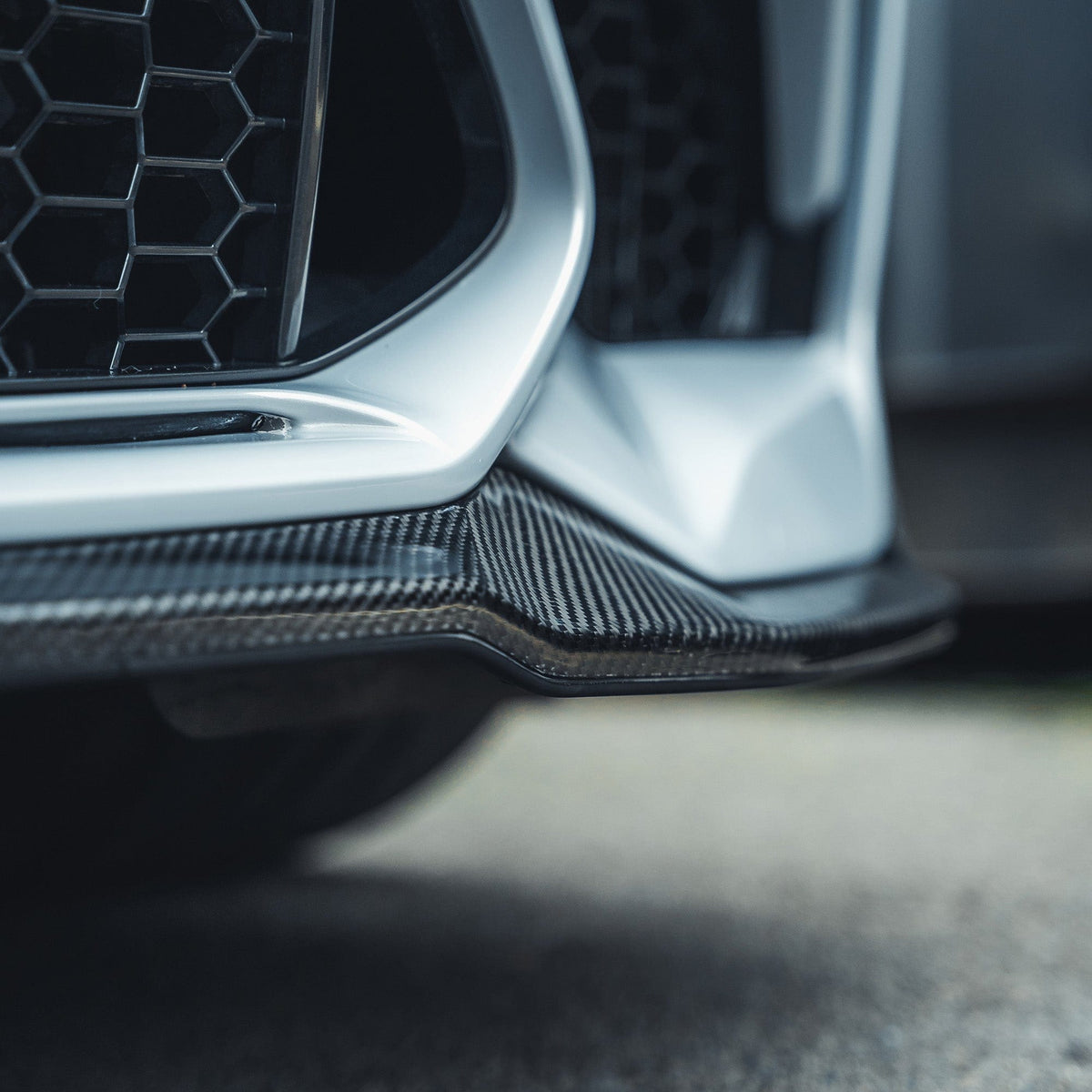 BMW M2C F87 full carbon fiber kit by CT Carbon, featuring CS style components on a sleek, high-performance sports car.