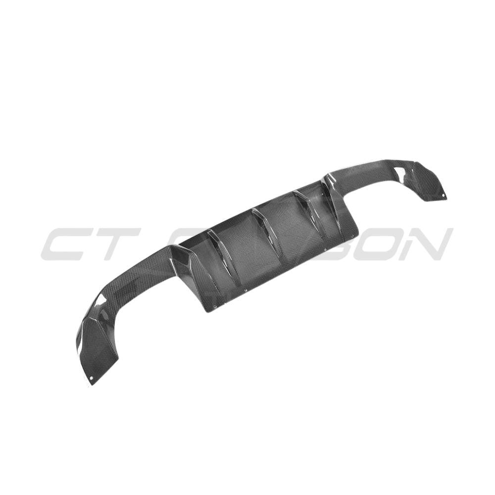 BMW M2C F87 full carbon fiber kit by CT Carbon, featuring V3 design with carbon fiber components on the car.