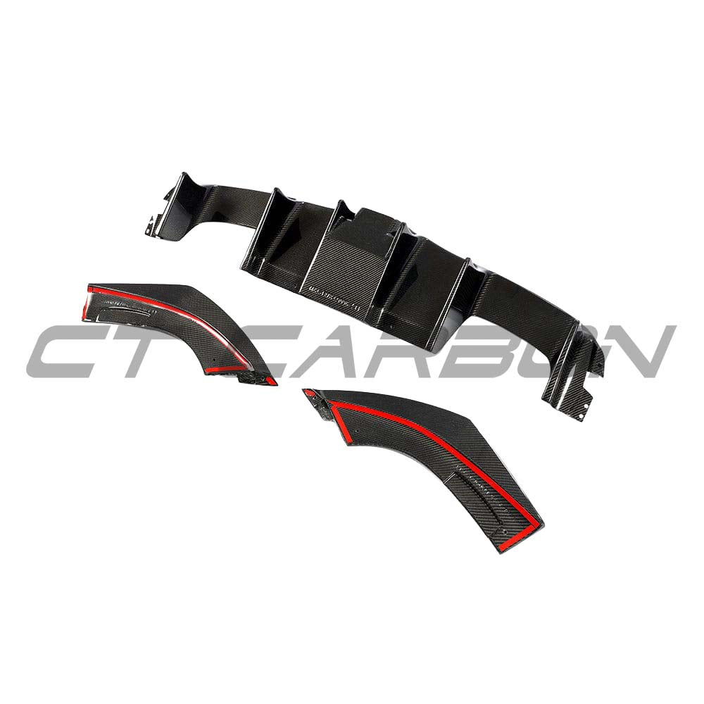 BMW M2/M2C F87 carbon fibre diffuser by CT Carbon with aggressive design, showcasing sleek carbon fibre finish and aerodynamic details.