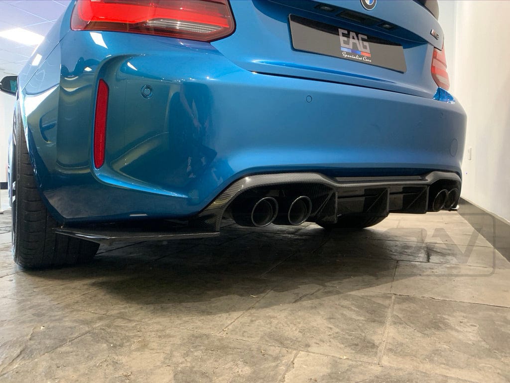 BMW M2 M2C F87 carbon fiber diffuser by CT Carbon, V4 style, showcasing the sleek aerodynamic design and carbon fiber finish.