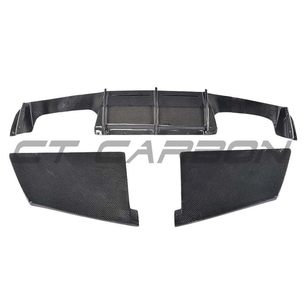 BMW M2 F87 carbon fiber diffuser by CT Carbon, showcasing sleek V4 style with textured carbon fiber finish and aerodynamic design.