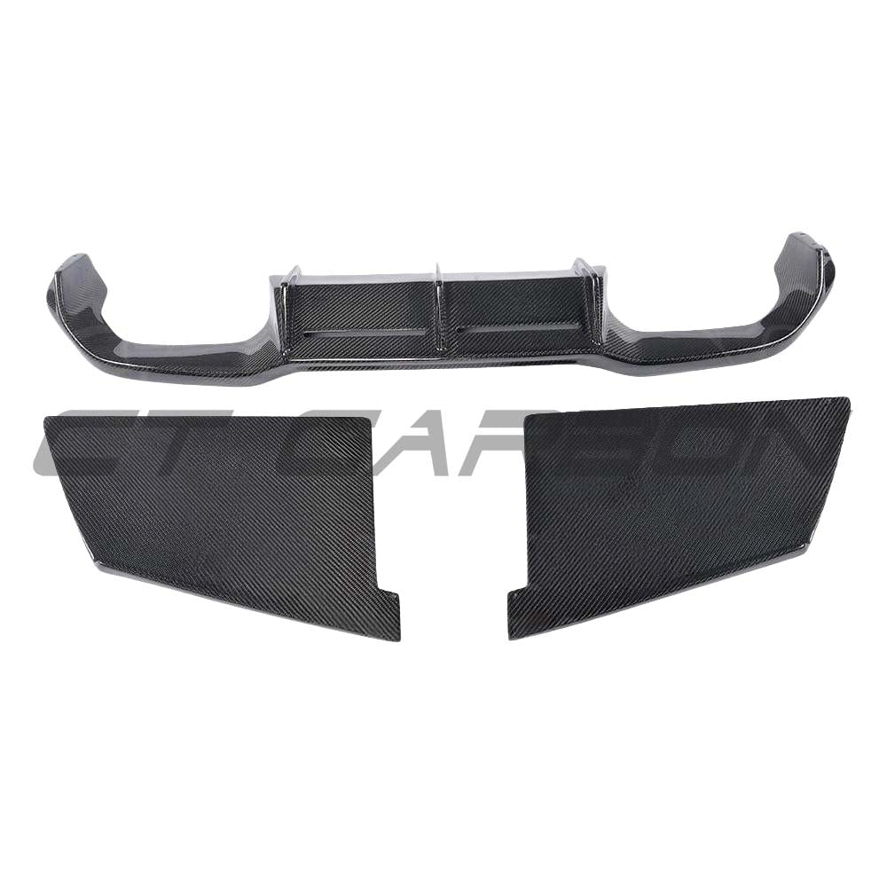 BMW M2 F87 carbon fibre diffuser by CT Carbon, V4 style, showcasing sleek carbon fiber design and sporty rear aerodynamic enhancement.
