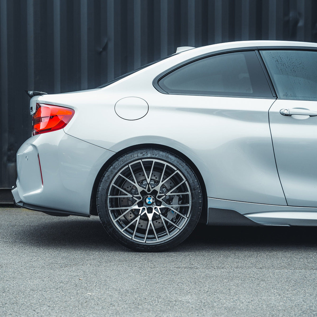 BMW M2 F87 carbon fibre side skirts by CT Carbon, V1, featuring sleek MP style design for enhanced aerodynamics and sporty look