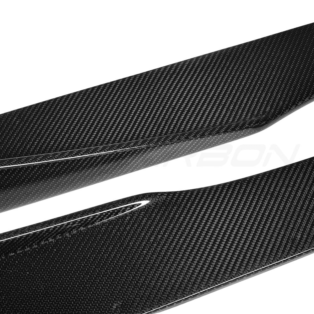 BMW M2 F87 carbon fibre side skirts by CT Carbon, V2 style, showcasing sleek, lightweight aerodynamic design.