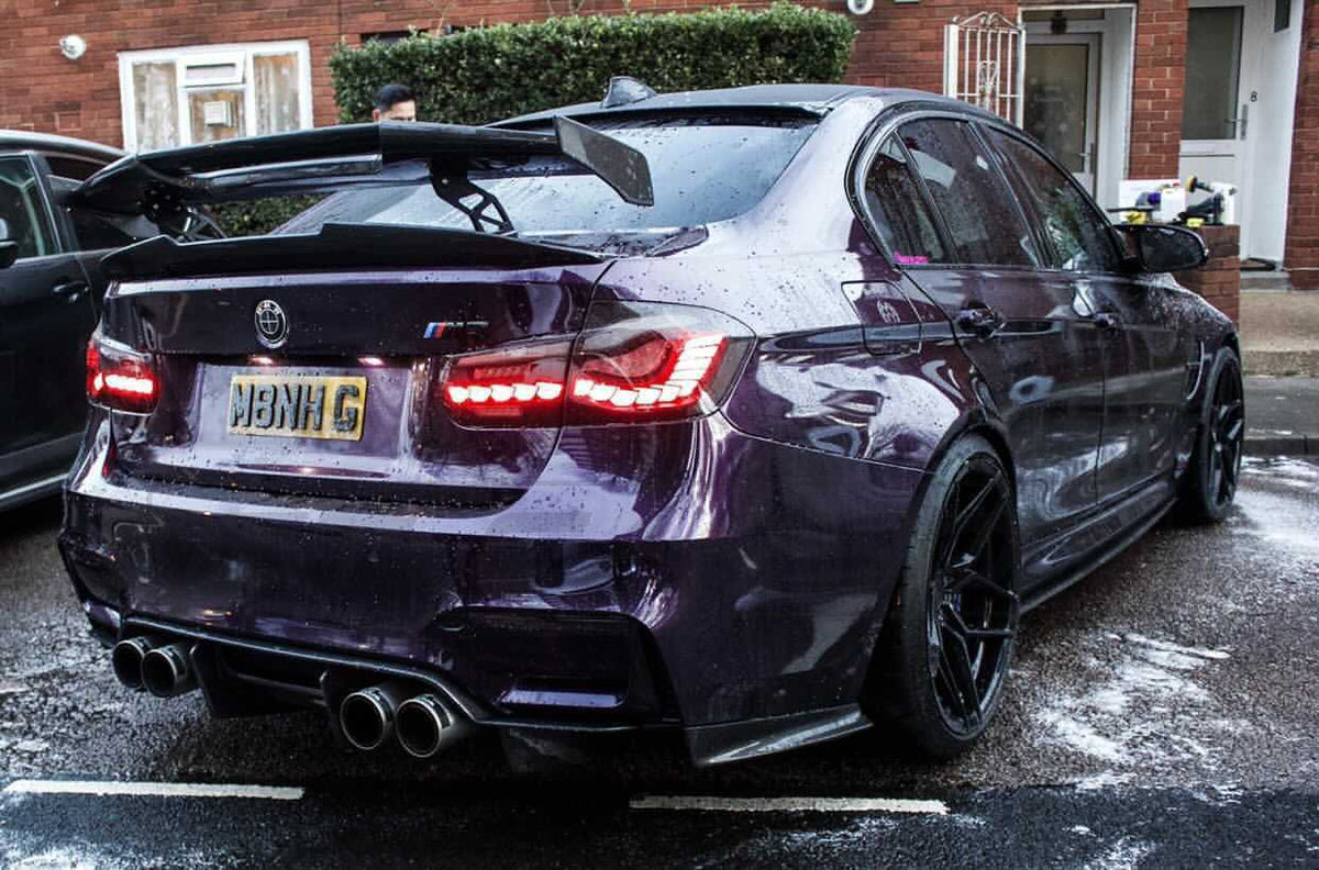 BMW M2 M3 M4 carbon fibre wing spoiler by CT Carbon, V2 style, showcasing the sleek, lightweight aerodynamic design.