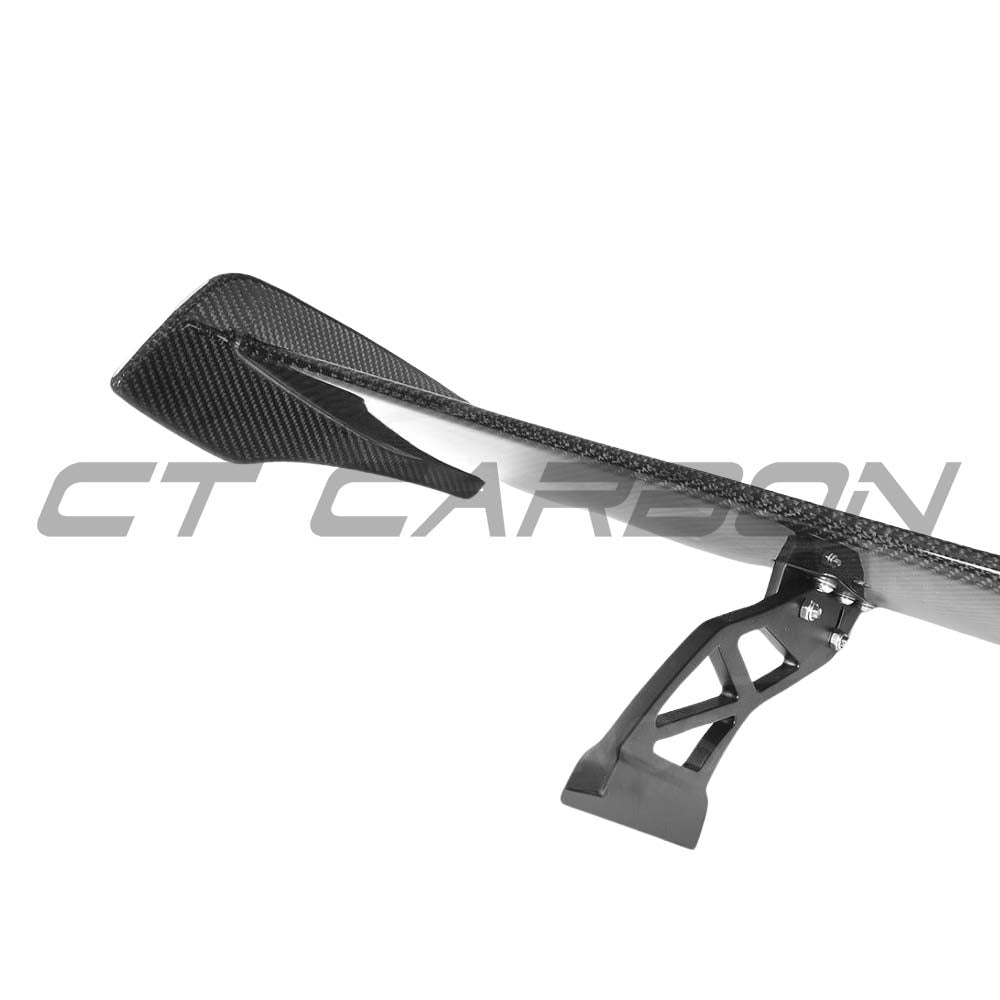 BMW M2, M3, M4 carbon fiber wing spoiler by CT Carbon, V2 style, showcasing the sleek aerodynamic design.
