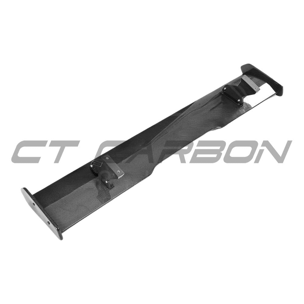 BMW F87 M2 2016-2018 CT Carbon full carbon fibre kit with GTS-style spoiler on the car's rear, showcasing sleek carbon fibre details.