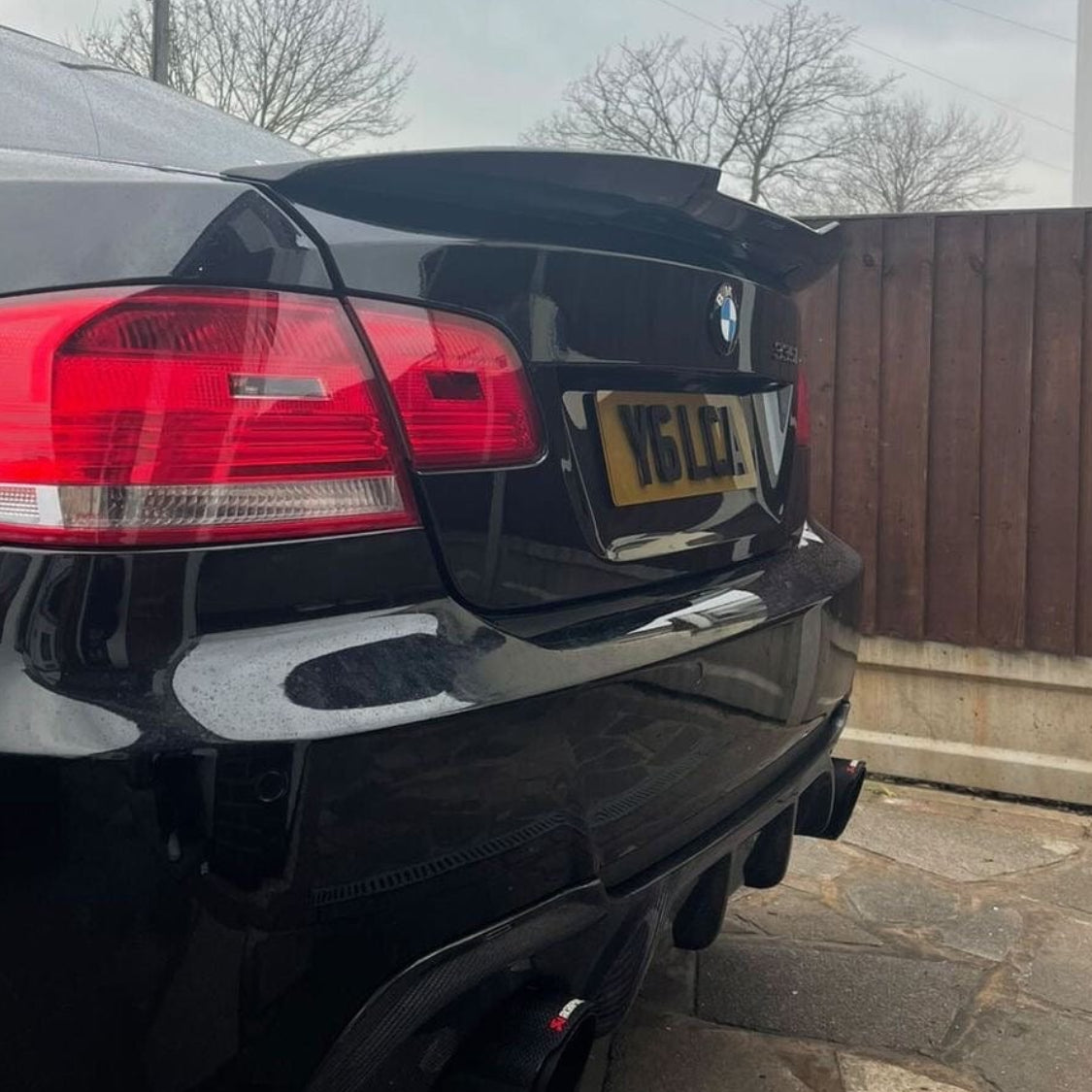 BMW M3 and 3 Series E92 carbon fibre spoiler by CT Carbon, showcasing the sleek, aerodynamic V2 design on the car.