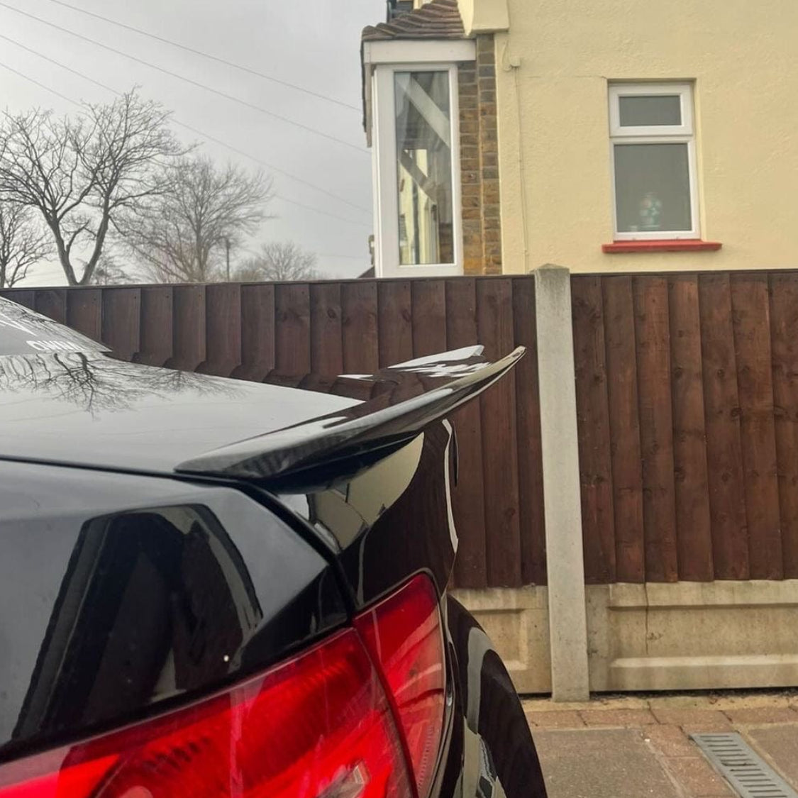 BMW M3 and 3 Series E92 carbon fiber spoiler by CT Carbon, featuring a sleek, aerodynamic design for enhanced performance.