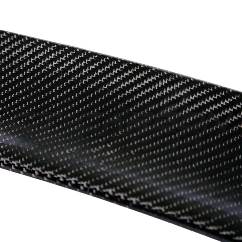 BMW M3 and 3 Series E90 carbon fibre spoiler by CT Carbon, shown installed on the car's rear, highlighting its sleek, aerodynamic design.