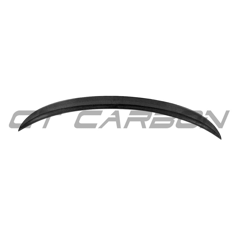 BMW M3 and 3 Series E90 carbon fiber spoiler by CT Carbon, featuring a sleek MP style design on a black car.