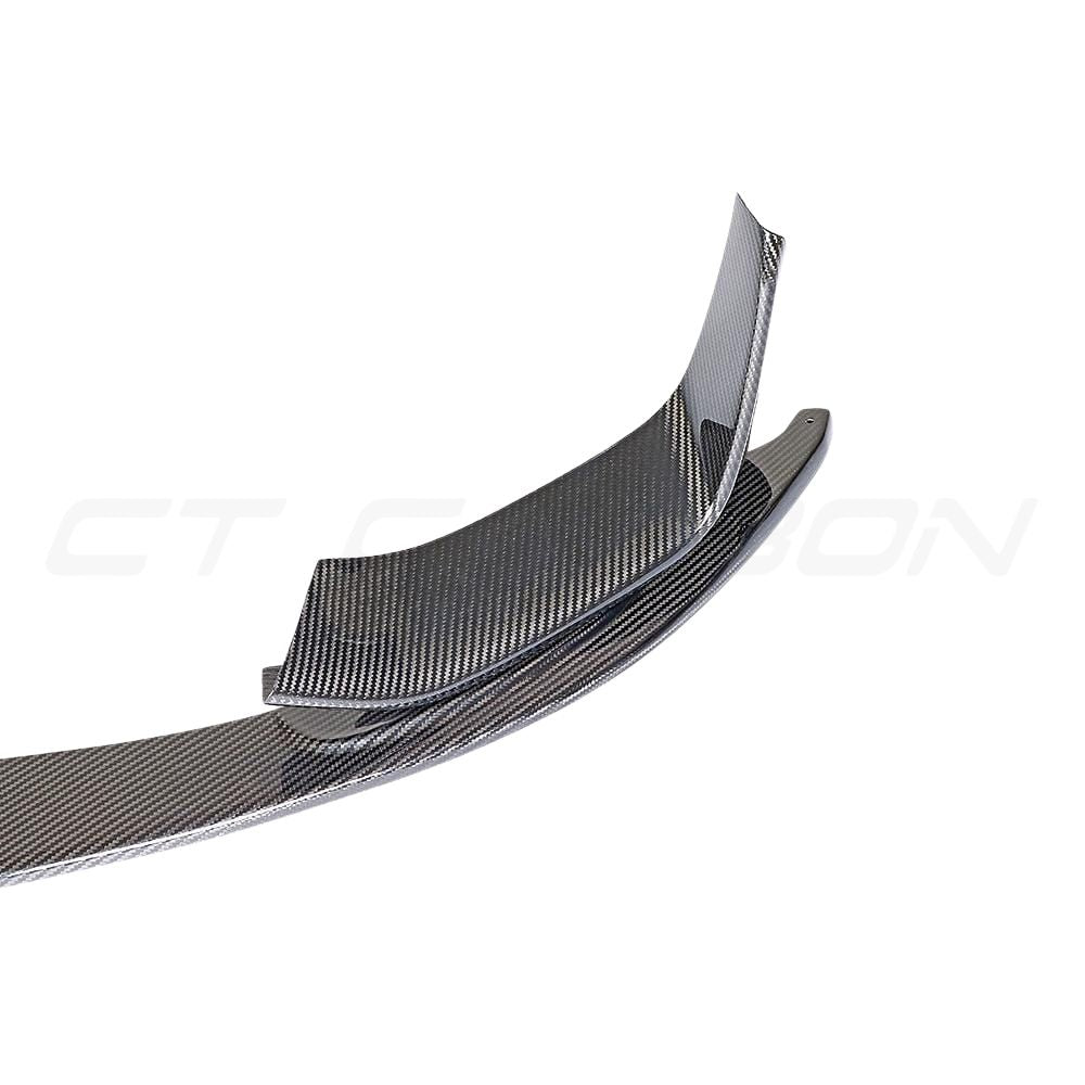 BMW M3 F80 full carbon fibre kit by CT Carbon, including MP-style components, showcased on a sleek sports car.