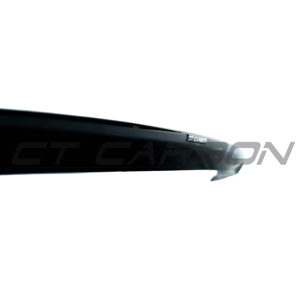BMW M3 F80 full gloss black kit by CT Carbon, showing close-up of high-quality black carbon fiber exterior components.