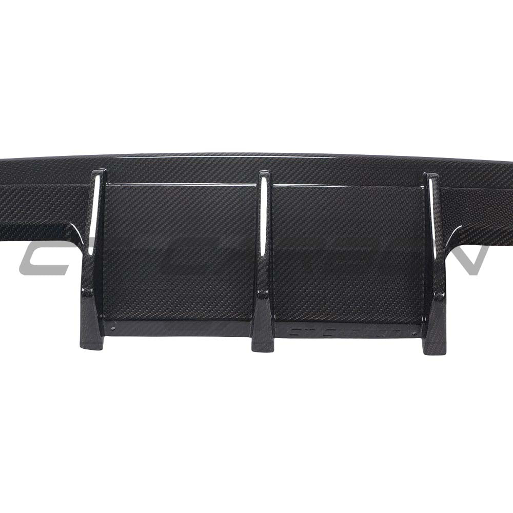 BMW M3 G80 G81 carbon fibre diffuser by CT Design, showcasing sleek black carbon fiber surface and aerodynamic design.