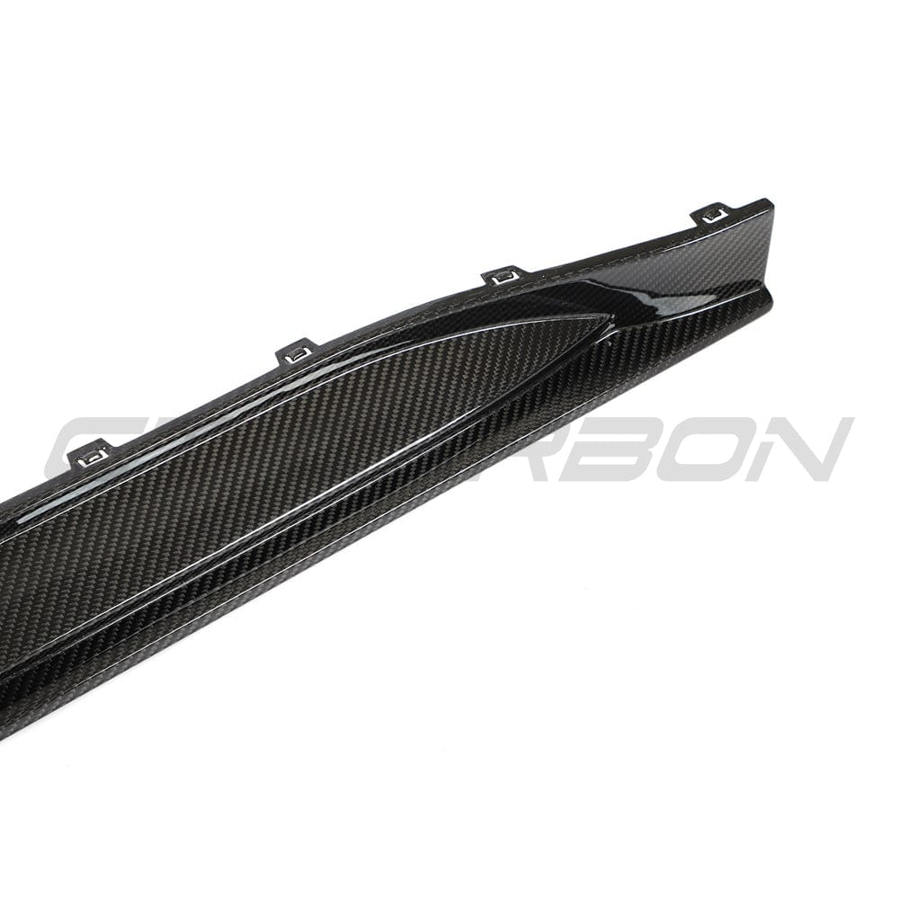 BMW G80 M3 full carbon fiber side skirt replacement kit by CT Design, featuring sleek, lightweight carbon fiber construction.