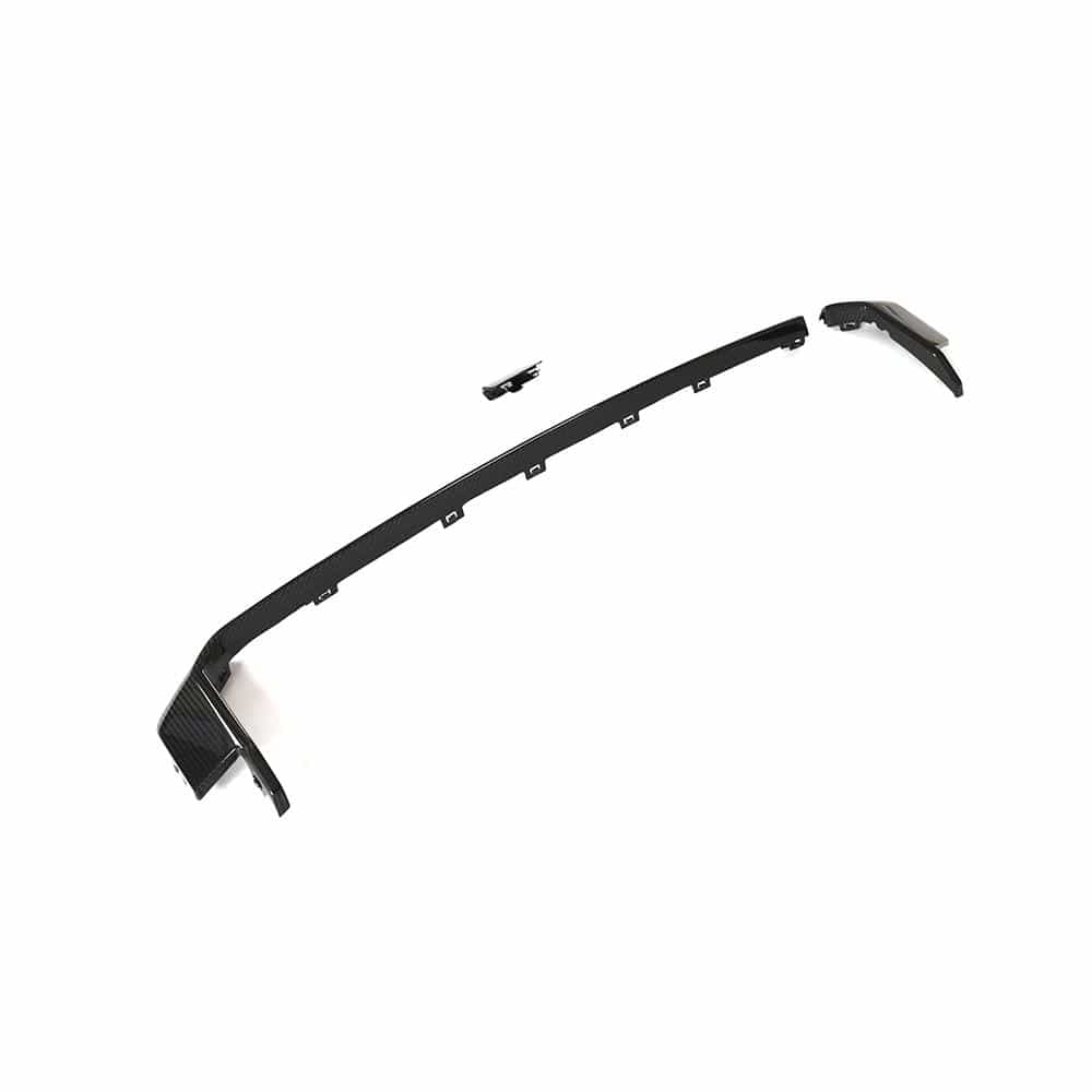 BMW M3 and M4 G80 G81 G82 G83 carbon fiber diffuser trim by CT Carbon, showcasing sleek, lightweight automotive accessory details.