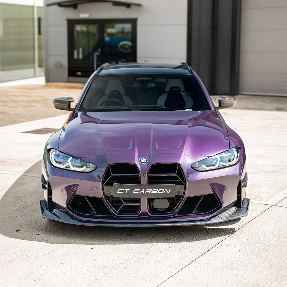 BMW M3 M4 G80 G81 G82 G83 carbon fibre splitter by CT Carbon, CSL style, showing sleek aerodynamic design and textured finish.