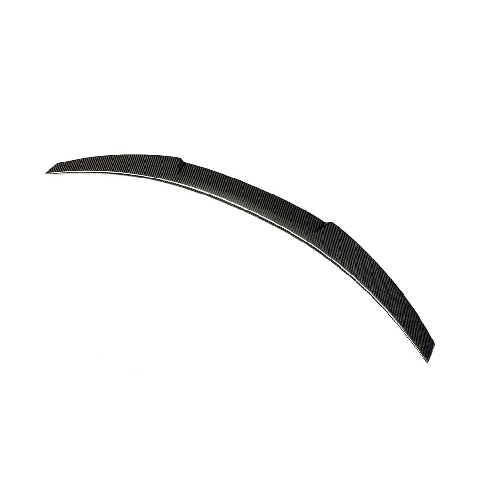BMW M3 G80 G20 2018+ CT Carbon wet carbon fibre spoiler V3 style on the car’s rear for a sporty, aerodynamic look.