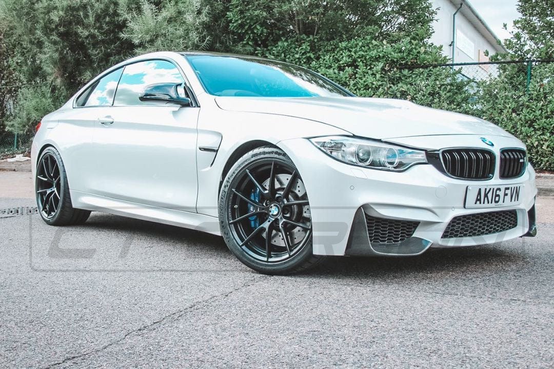 BMW M3 M4 F80 F82 F83 carbon splitter by CT Carbon, showcasing sleek, lightweight aerodynamic canards for enhanced performance.