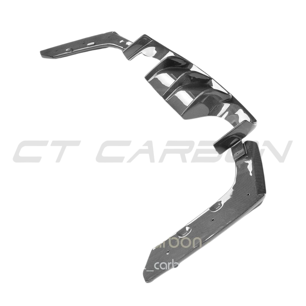 BMW M3 M4 F80 F82 F83 carbon fibre diffuser by CT Carbon, V2 style, showcasing the sleek, lightweight aerodynamic design.