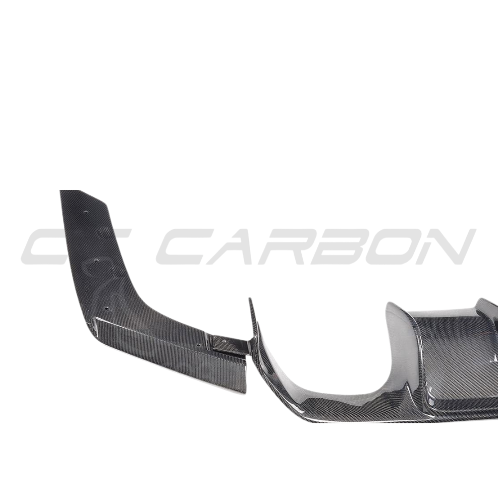 BMW M3 M4 F80 F82 F83 carbon fiber diffuser by CT Carbon, V2 style, showcasing sleek automotive performance and lightweight design.