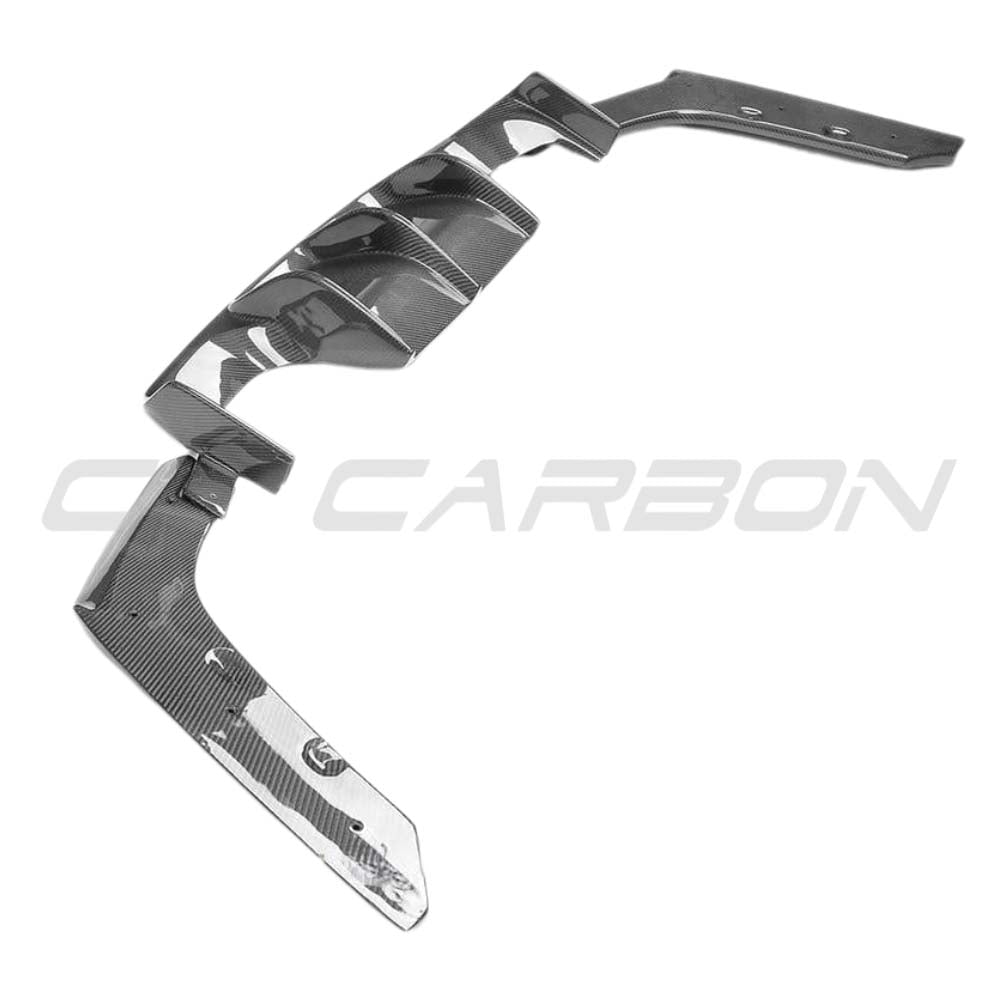 BMW M3 F80 saloon full carbon fibre kit by CT Carbon, featuring diffuser and V-style accents on the car's rear.