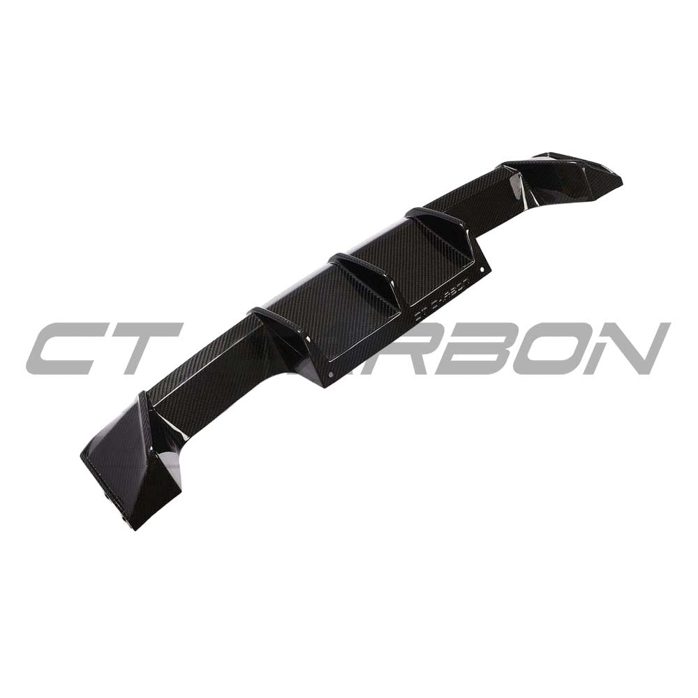 BMW G82 M4 carbon fibre kit by CT Carbon, including diffuser and body panels, showcased on a sleek sports car.