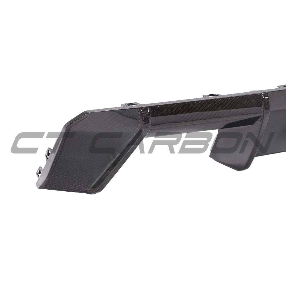 BMW G80 M3 full carbon fiber kit by CT Carbon, featuring a diffuser and aerodynamic components, shown on the car.