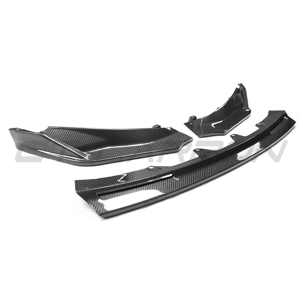 BMW M3/M4 G80/G81/G82/G83 carbon fiber front end pack by CT Carbon, featuring aerodynamic design and carbon fiber finish.