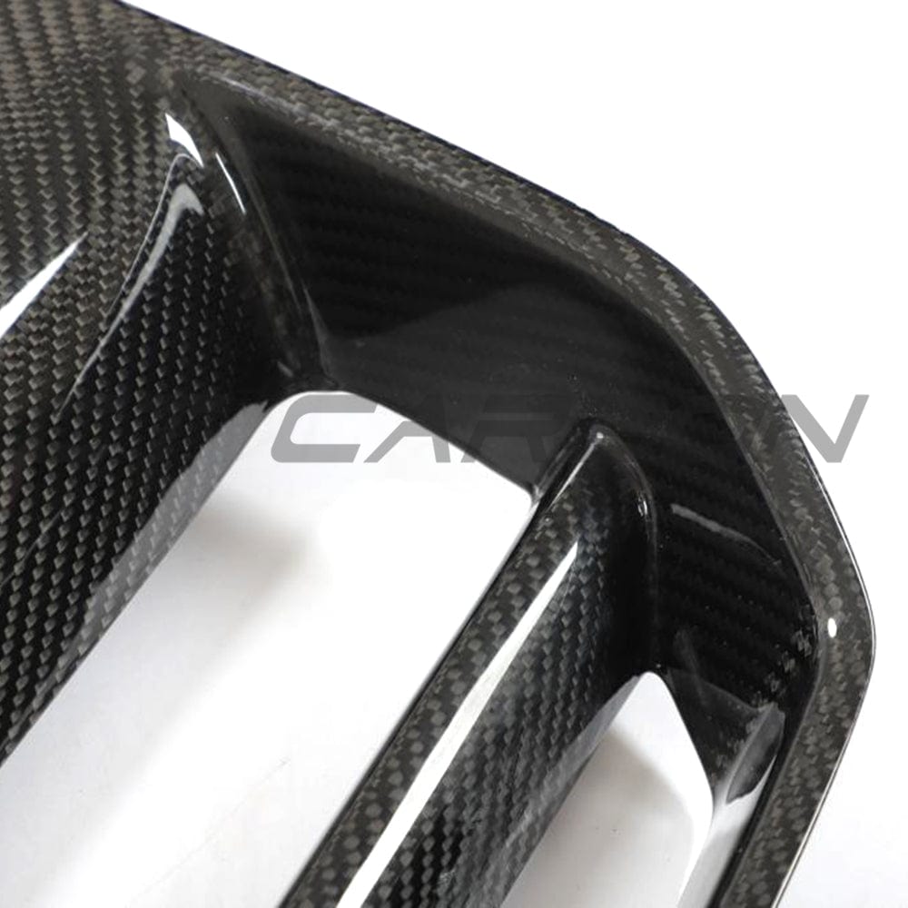 BMW M3 M4 G80 G81 G82 G83 carbon fiber front end pack by CT Carbon, featuring GT-style grille and aggressive front design.
