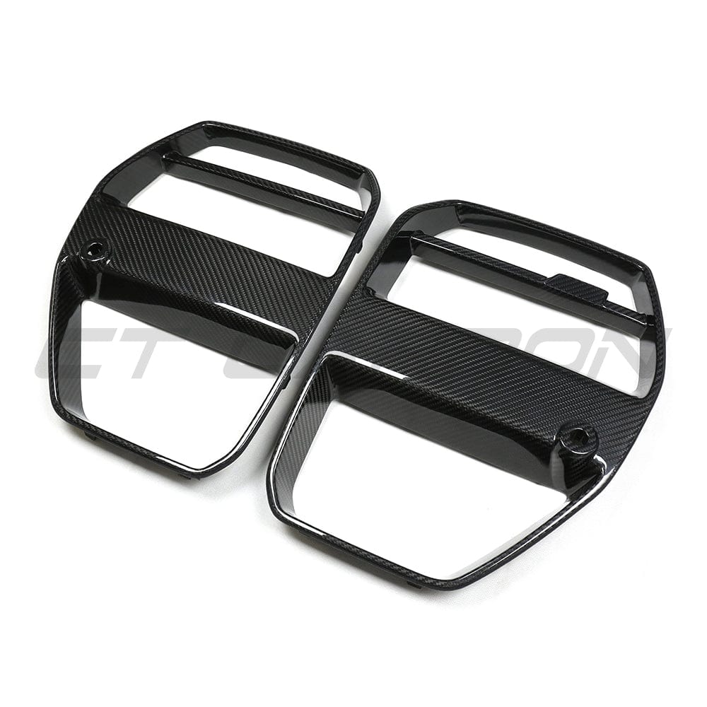 BMW M3 M4 G80 G82 G83 carbon fiber front end pack by CT Carbon with GT-style grille, showcasing lightweight, high-performance design.