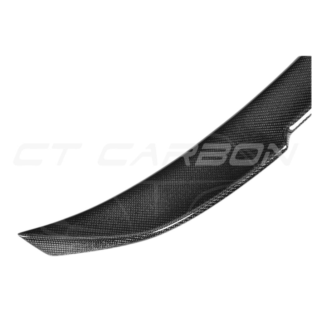 BMW M4 F82 carbon fibre CS style spoiler by CT Carbon, showcasing the sleek, lightweight carbon fiber design on the car's rear.