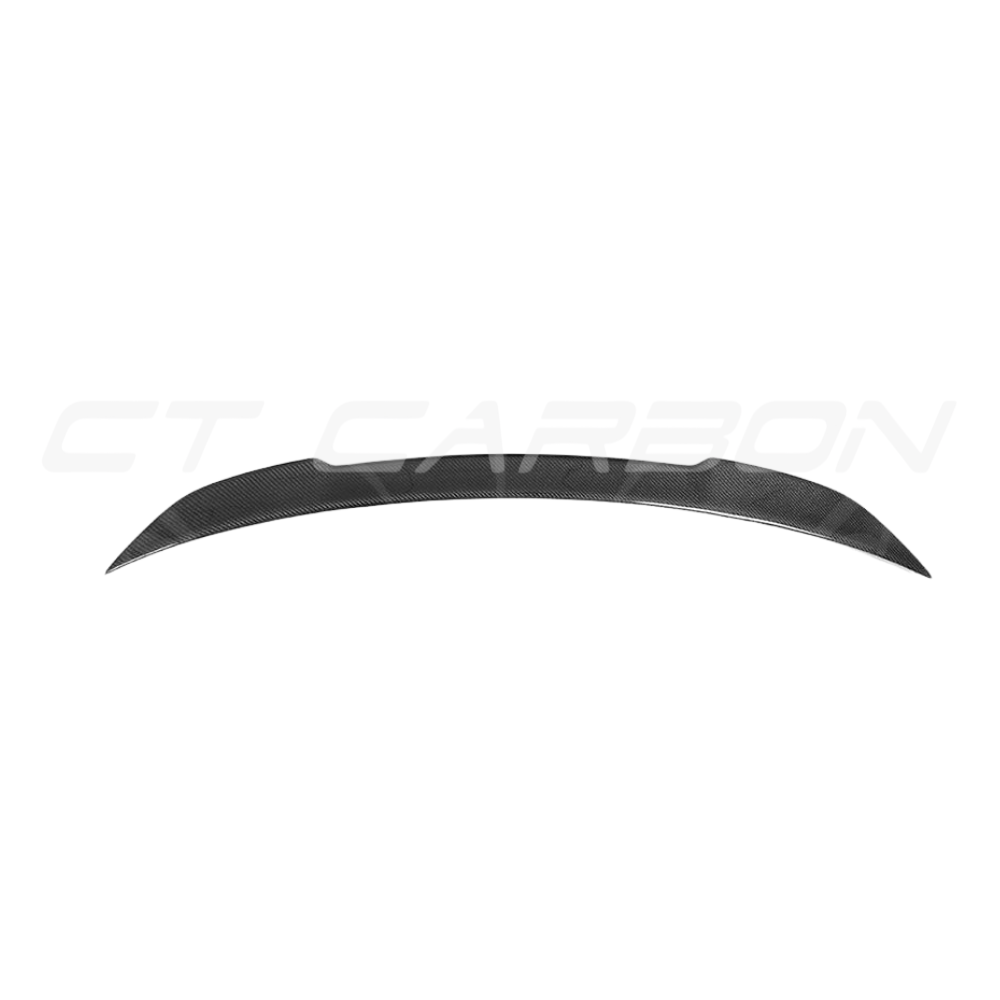 BMW M4 F82 carbon fibre CS style spoiler by CT Carbon, showcasing the sleek, aerodynamic design on the car's rear.
