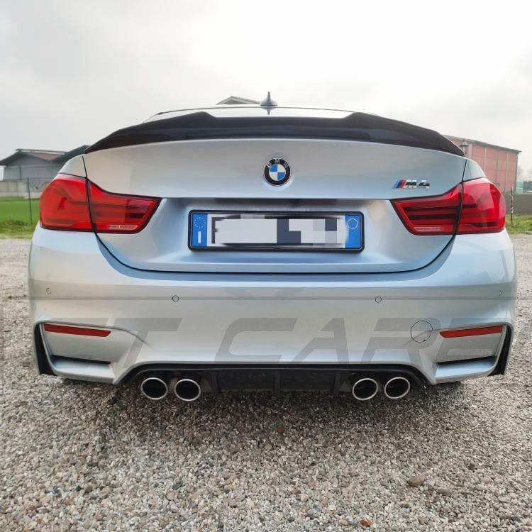 BMW M4 F82 carbon fiber spoiler with ducktail PS style by CT Carbon, showcasing the sleek, aerodynamic design.