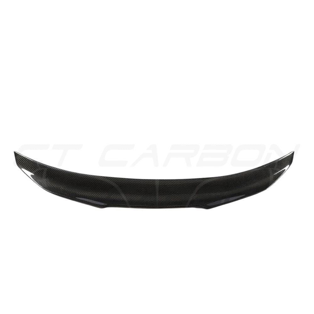 BMW M4 F82 carbon fiber spoiler with ducktail PS style, lightweight and aerodynamic, by CT Carbon, shown on the car's rear.