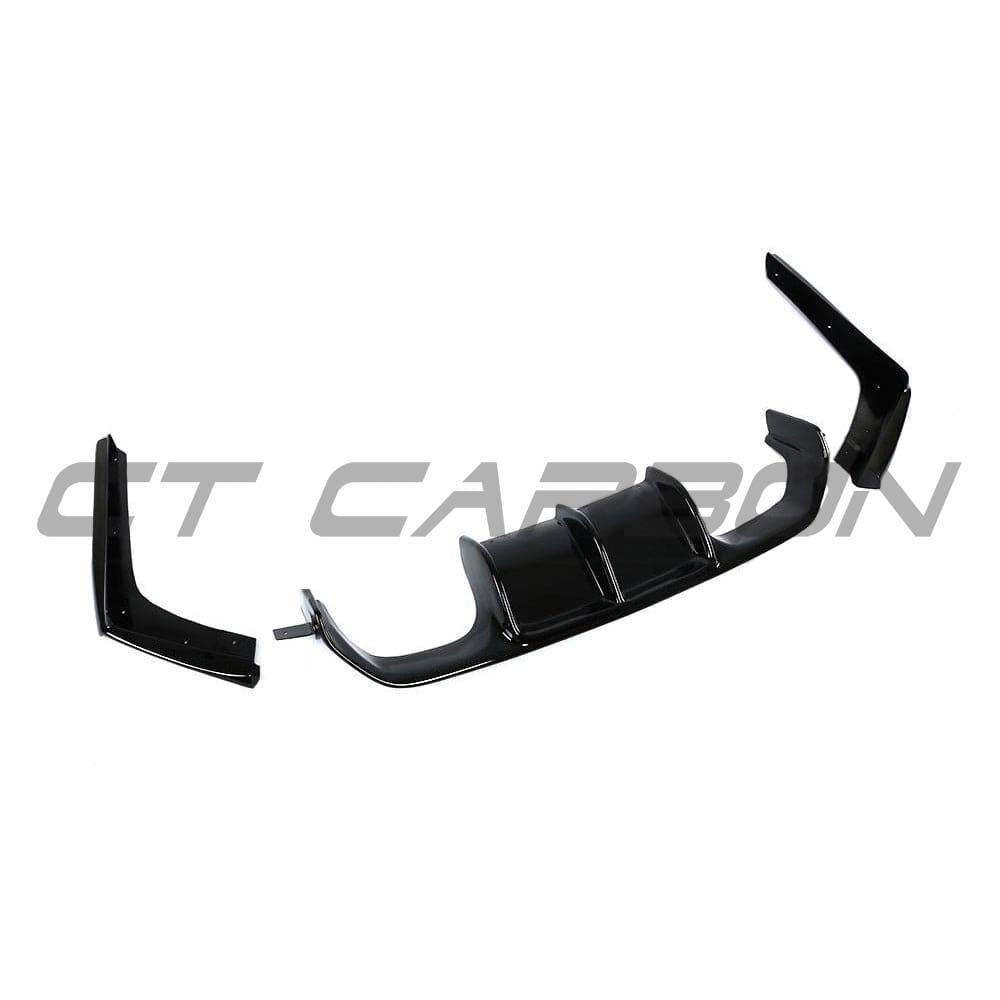 BMW M4 F82 coupe with CT Carbon full gloss black kit, showcasing sleek body panels and carbon fiber accents.