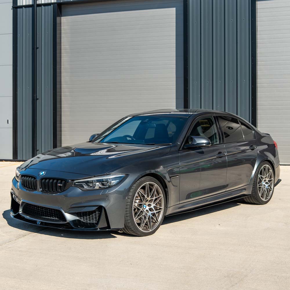 BMW M3 M4 F80 F82 F83 GLOSS BLACK SIDE SKIRTS by CT Carbon, sleek and durable automotive side skirts for enhanced style.