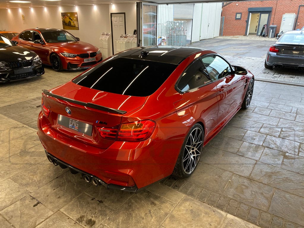 BMW F82 M4 coupe 2014-2020 CT Carbon full carbon fibre kit, V2, including roof, hood, and side panels, in a sleek glossy finish.
