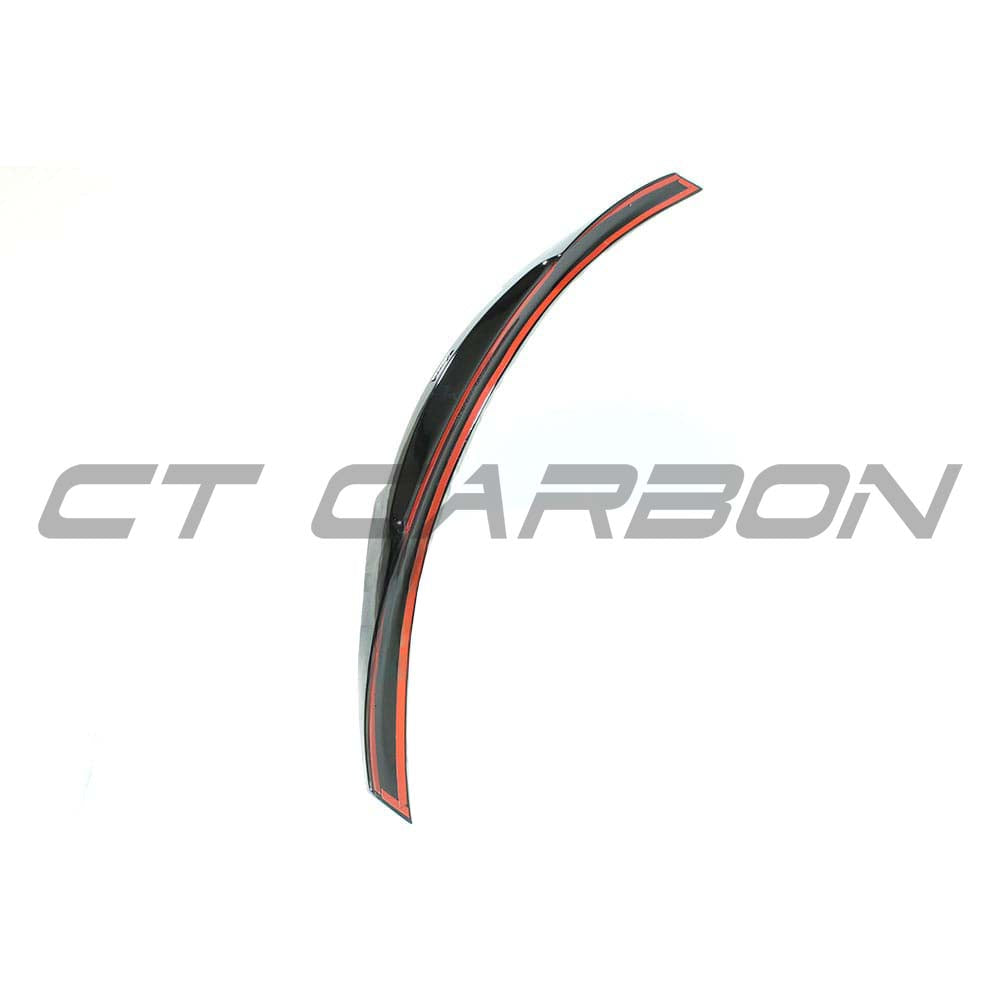 BMW M4 F82 G82 gloss black V-style spoiler by CT Carbon, showing sleek aerodynamic design and glossy black finish.