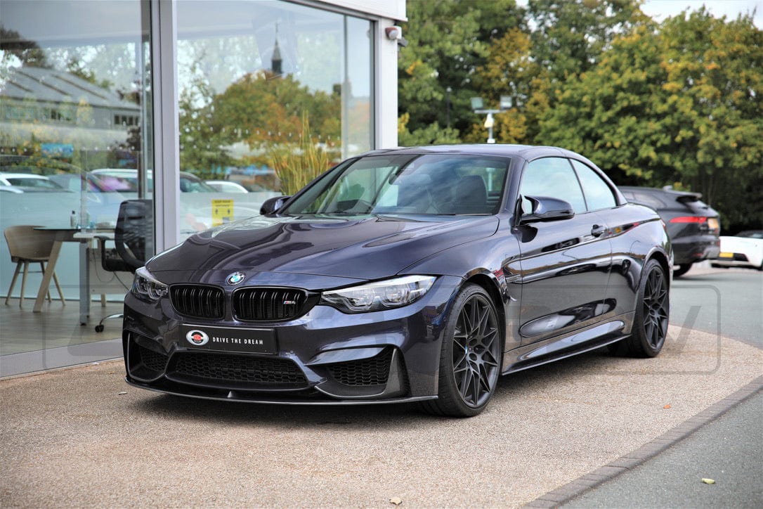 BMW M4 F83 convertible full carbon fiber kit by CT Carbon, showing detailed carbon fiber components on the car's exterior.