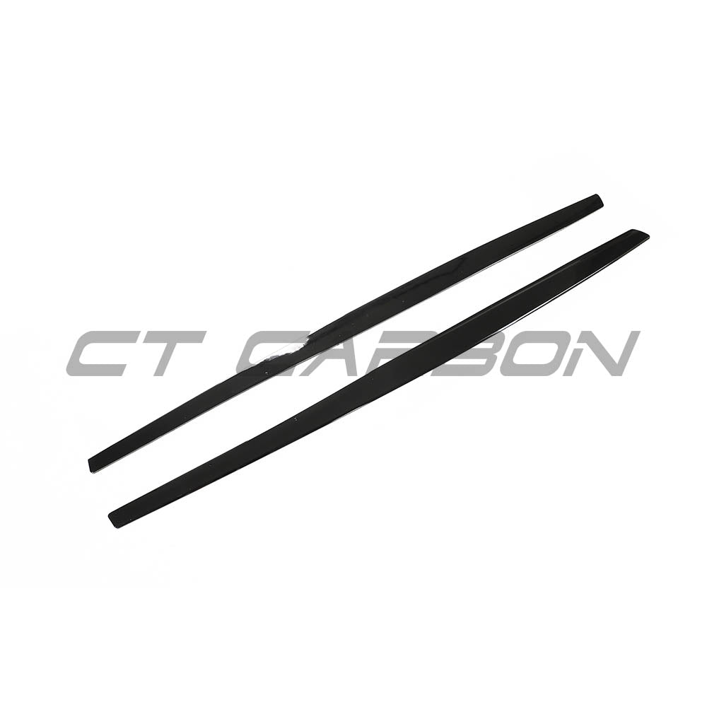BMW M4 F82 coupe full gloss black kit by CT Carbon, showcasing the sleek glossy black exterior parts of the vehicle.