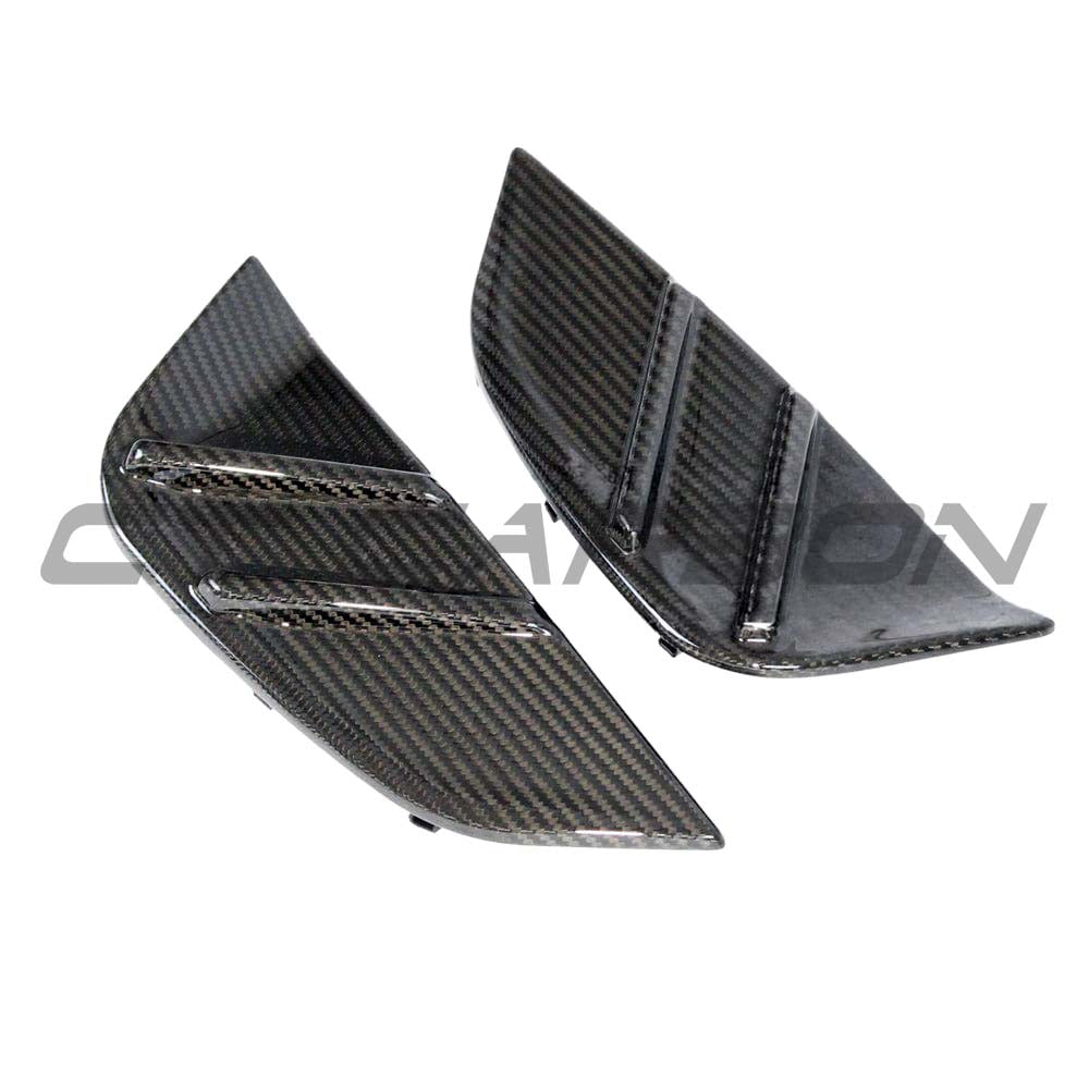 BMW M4 G82 G83 carbon fibre replacement side fender trim by CT Carbon, showcasing sleek, lightweight accessory details.